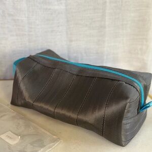 Stylish Gray Travel Bag with Blue Accents